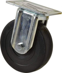 E.R. Wagner - 5" Diam x 1-3/8" Wide x 6-1/16" OAH Top Plate Mount Rigid Caster - Soft Rubber, 240 Lb Capacity, Delrin Bearing, 3-1/8 x 4-1/8" Plate - USA Tool & Supply