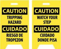 NMC - Caution - Tripping Hazard, Caution - Watch Your Step, 12" Wide x 19" High, Plastic Floor Sign - English/Spanish, A-Frame, Black on Yellow, For Accident Prevention - USA Tool & Supply