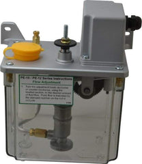 Trico - 2 L Reservoir Capacity, 3 - 6 cm Output per Cycle, 36-72 cm Output per Hour, Electric Central Lubrication System - 5 Min Interval Between Cycles, 130mm Wide x 225mm High, 110 Volts, Oil, 5/16-24 Outlet Thread - USA Tool & Supply