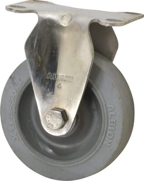 Albion - 4" Diam x 1-1/4" Wide x 5-1/8" OAH Top Plate Mount Rigid Caster - Soft Rubber, 410 Lb Capacity, Delrin Bearing, 2-1/2 x 3-5/8" Plate - USA Tool & Supply