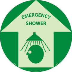 NMC - Adhesive Backed Floor Signs; Message Type: First Aid ; Graphic Type: Head under Shower in Up Arrow ; Message or Graphic: Message & Graphic ; Legend: Emergency Shower ; Color: Green; Beige ; Special Color Properties: Glow-In-The-Dark - Exact Industrial Supply