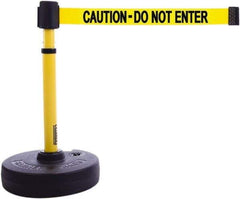 Banner Stakes - 22 to 42" High, 2-3/8" Pole Diam, Barrier Post Base & Stanchion - 9" Base Diam, Round Nylon Base, Yellow Plastic Post, 15' x 2-1/2" Tape, For Outdoor Use - USA Tool & Supply