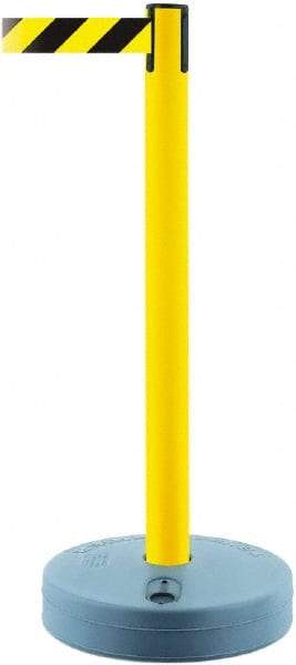 Tensator - 38" High, 2-1/2" Pole Diam, Barricade Tape Dispenser - 14" Base Diam, Round Plastic Base, Yellow Polymer Post, 7-1/2' x 1-7/8" Tape, Single Line Tape, For Outdoor Use - USA Tool & Supply