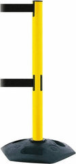 Tensator - 38" High, 2-1/2" Pole Diam, 4 Way Stanchion - 19" Base Diam, Octagon Recycled Rubber Base, Yellow Plastic Post, 7-1/2' x 2" Tape, Dual Line Tape, For Outdoor Use - USA Tool & Supply