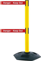 Tensator - 38" High, 2-1/2" Pole Diam, 4 Way Stanchion - 19" Base Diam, Octagon Recycled Rubber Base, Yellow Plastic Post, 13' x 2" Tape, Dual Line Tape, For Outdoor Use - USA Tool & Supply