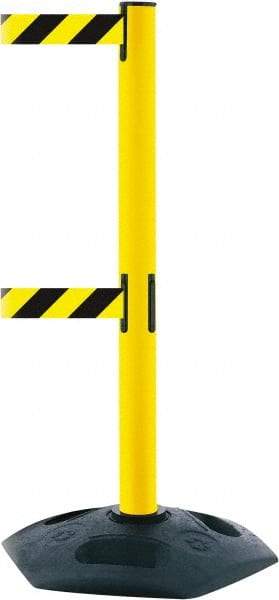 Tensator - 38" High, 2-1/2" Pole Diam, 4 Way Stanchion - 19" Base Diam, Octagon Recycled Rubber Base, Yellow Plastic Post, 13' x 2" Tape, Dual Line Tape, For Outdoor Use - USA Tool & Supply
