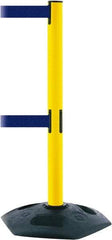 Tensator - 38" High, 2-1/2" Pole Diam, 4 Way Stanchion - 19" Base Diam, Octagon Recycled Rubber Base, Yellow Plastic Post, 13' x 2" Tape, Dual Line Tape, For Outdoor Use - USA Tool & Supply