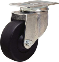 Hamilton - 3-1/2" Diam x 1-1/4" Wide x 4-13/16" OAH Top Plate Mount Swivel Caster - Hard Rubber, 140 Lb Capacity, Self-Lubricating Bearing, 2-1/2 x 3-3/4" Plate - USA Tool & Supply
