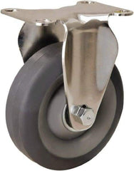 Hamilton - 4" Diam x 1-3/8" Wide x 5-1/8" OAH Top Plate Mount Rigid Caster - Rubber Mold on Polyolefin, 250 Lb Capacity, Delrin Bearing, 2-3/8 x 3-5/8" Plate - USA Tool & Supply