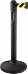 Lavi Industries - 38-1/4" High, 3-1/4" Pole Diam, Stanchion - 16" Base Diam, Dome Recycled Rubber Base, Black Plastic Post, 12' x 2" Tape, Single Line Tape, For Outdoor Use - USA Tool & Supply