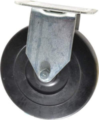 E.R. Wagner - 5" Diam x 1" Wide x 5-13/16" OAH Top Plate Mount Rigid Caster - Hard Rubber, 145 Lb Capacity, Delrin Bearing, 2-3/4 x 3-3/4" Plate - USA Tool & Supply
