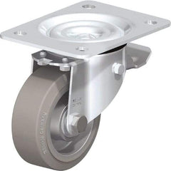 Blickle - 4" Diam x 1-37/64" Wide x 5-7/64" OAH Top Plate Mount Swivel Caster with Brake - Solid Rubber, 440 Lb Capacity, Ball Bearing, 5-1/2 x 4-3/8" Plate - USA Tool & Supply