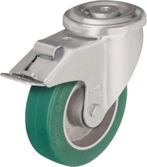 Blickle - 4" Diam x 1-37/64" Wide x 5-35/64" OAH Hollow Kingpin Mount Swivel Caster with Brake - Polyurethane-Elastomer Blickle Softhane, 660 Lb Capacity, Ball Bearing, Hollow Kingpin Stem - USA Tool & Supply