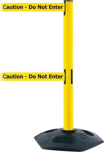Tensator - 38" High, 2-1/2" Pole Diam, 4 Way Stanchion - 19" Base Diam, Octagon Recycled Rubber Base, Yellow Plastic Post, 7-1/2' x 2" Tape, Dual Line Tape, For Outdoor Use - USA Tool & Supply
