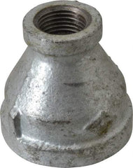 B&K Mueller - Class 150, 1-1/4 x 1/2" Galvanized Pipe Reducing Coupling - Threaded, Malleable Iron - USA Tool & Supply