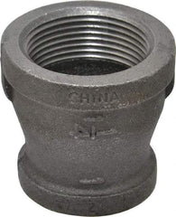 B&K Mueller - Size 1-1/4 x 1", Class 150, Malleable Iron Black Pipe Reducing Coupling - 150 psi, Threaded End Connection - USA Tool & Supply