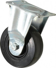 Fairbanks - 4" Diam x 1-1/4" Wide x 5-13/32" OAH Top Plate Mount Rigid Caster - Hard Rubber, 275 Lb Capacity, Self-Lubricating Bearing, 2-7/8 x 3-5/8" Plate - USA Tool & Supply