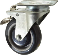 Value Collection - 4" Diam x 1-1/4" Wide x 5-13/32" OAH Top Plate Mount Swivel Caster with Brake - Polyurethane, 235 Lb Capacity, Ball Bearing, 2-7/8 x 3-5/8" Plate - USA Tool & Supply