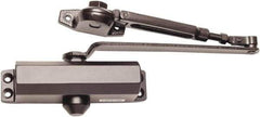 Falcon - 7" Closer Body Length, Light-Duty ADA Complaint Door Closer to Hold Open Manual Damper - Dark Bronze Finish - USA Tool & Supply