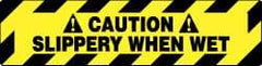 NMC - Caution - Slippery When Wet, Anti-Skid Pressure-Sensitive Vinyl Floor Sign - Rectangle, Black on Yellow, Adhesive Backed, For Accident Prevention - USA Tool & Supply