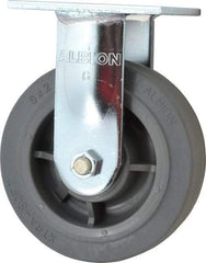 Albion - 6" Diam x 2" Wide x 7-1/2" OAH Top Plate Mount Rigid Caster - Soft Rubber, 600 Lb Capacity, Precision Sealed Bearing, 4 x 4-1/2" Plate - USA Tool & Supply