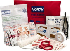 North - 39 Piece, 10 Person, Multipurpose/Auto/Travel First Aid Kit - 4-1/2" Wide x 1-1/2" Deep x 7" High, Nylon Bag - USA Tool & Supply