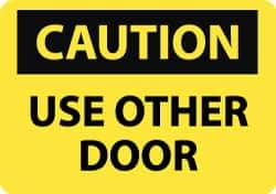 NMC - Caution - Use Other Door, Aluminum Fire and Exit Sign - 14" Wide x 10" High - USA Tool & Supply